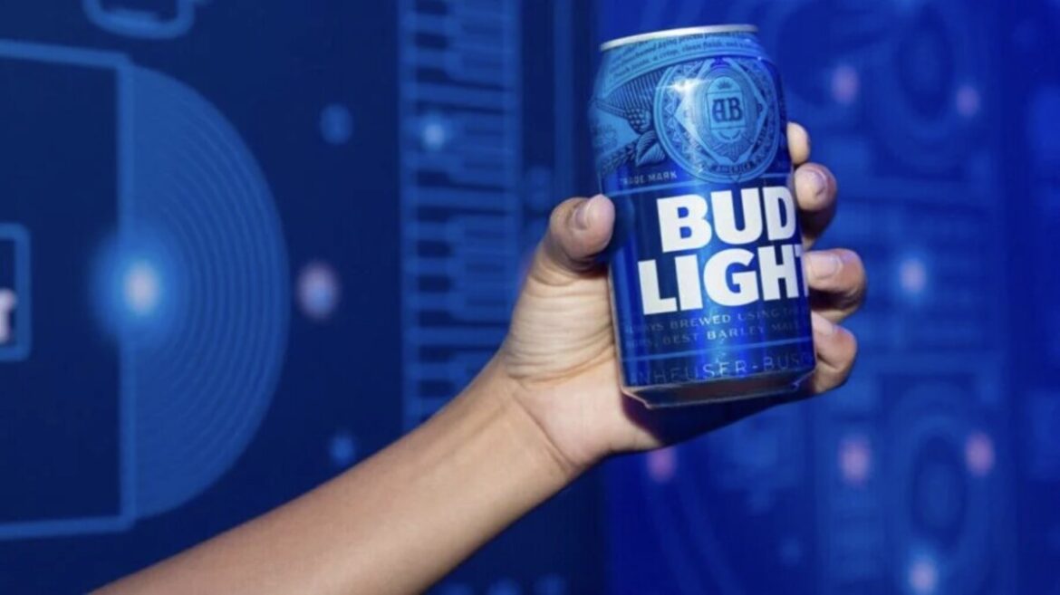 Bud Light A person holding a Bud Light can